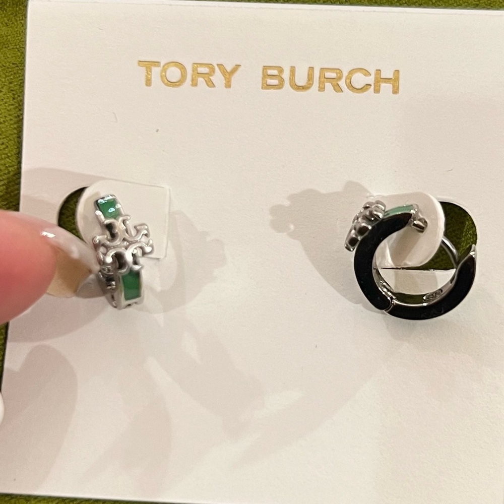 Tory Burch Kira enamel huggie earrings in silver-tone with a green enamel inset